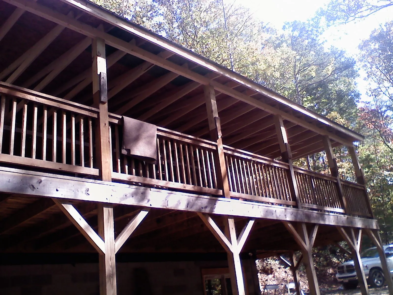Timber framing under a new elevated porch and deck — Roof Leak Repair in Grizzly Flats by Roofing Brothers